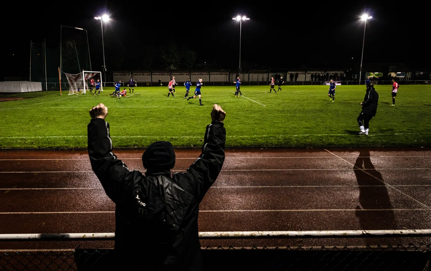 Floodlit football at Hornchurch Stadium, the Urchins' ground on Bridge Avenue. Photograph taken at an earlier match, not one from this season.